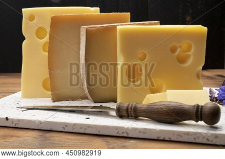 Swiss Cheese Collection, Emmentaler With Holes,  Gruyere, Appenzeller Fondue Cheeses