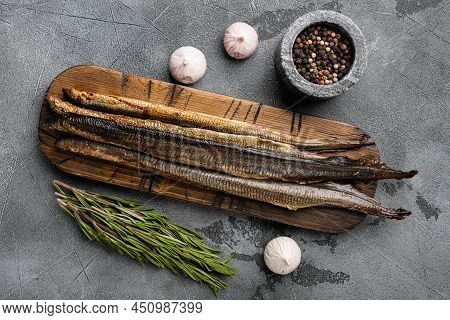 Fried River Lamprey Set, On Gray Stone Table Background, Top View Flat Lay