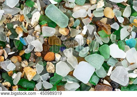 Colored Crystals Eroded By The Sea In The Beach Of The Crystals In The Silleiro Cape In Pontevedra