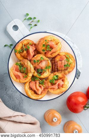 Yorkshire Pudding. Traditional English Yorkshire Pudding With Salmon And Radish Microgreens Side Dis