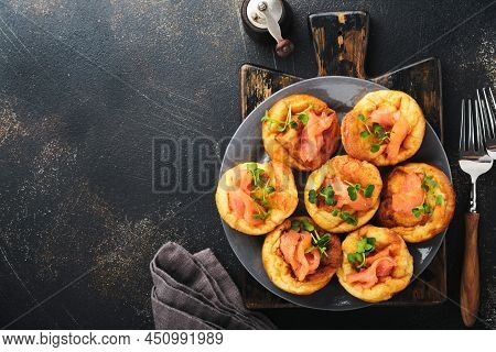 Yorkshire Pudding. Traditional English Yorkshire Pudding With Salmon And Radish Microgreens Side Dis