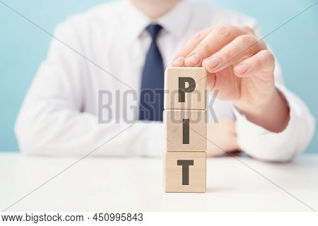 Polish Tax Concept With Businessman And Blocks. Pit Means Polish Income Tax