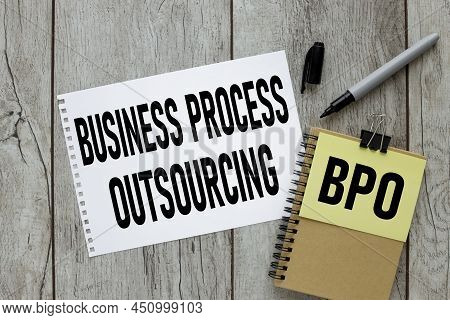 Bpo Business Process Outsourcing Text On White Paper On The Desktop