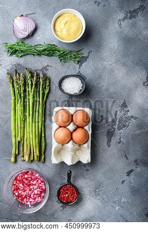 Organic Asparagus With Eggs And French Dressing Ingredients With Dijon Mustard, Onion Chopped In Red