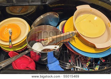 Kitchen Sink With Dirty Dishes Utensils And Pot