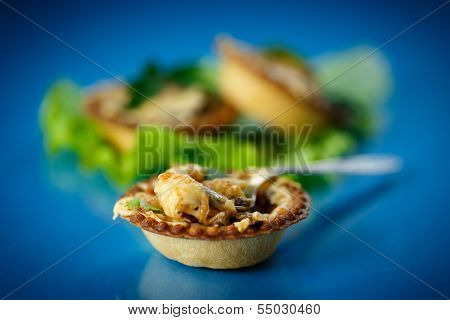 Baked Tartlets With Mushrooms And Cheese