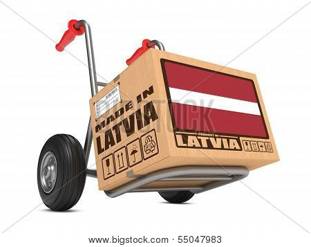 Made in Latvia - Cardboard Box on Hand Truck.