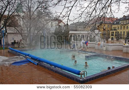 People Have A Thermal Bath In The Gellert Spa In Budapest