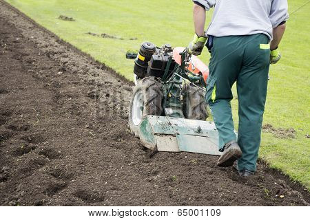 Man With Rototiller