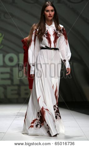 ZAGREB, CROATIA - MAY 09: Fashion model wearing clothes designed by Avaro Figlio on the Zagreb Fashion Week on May 09, 2014 in Zagreb, Croatia.