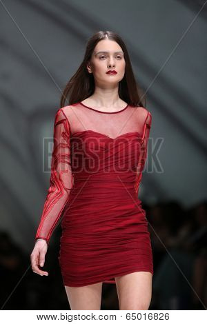 ZAGREB, CROATIA - MAY 09: Fashion model wearing clothes designed by Avaro Figlio on the Zagreb Fashion Week on May 09, 2014 in Zagreb, Croatia.