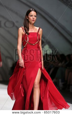 ZAGREB, CROATIA - MAY 09: Fashion model wearing clothes designed by Avaro Figlio on the Zagreb Fashion Week on May 09, 2014 in Zagreb, Croatia.