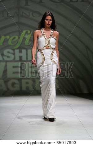 ZAGREB, CROATIA - MAY 09: Fashion model wearing clothes designed by Avaro Figlio on the Zagreb Fashion Week on May 09, 2014 in Zagreb, Croatia.