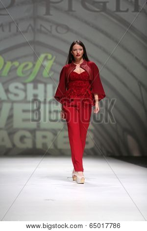 ZAGREB, CROATIA - MAY 09: Fashion model wearing clothes designed by Avaro Figlio on the Zagreb Fashion Week on May 09, 2014 in Zagreb, Croatia.