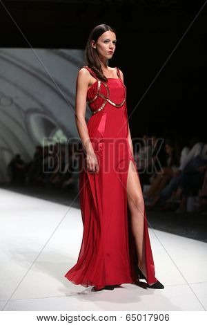 ZAGREB, CROATIA - MAY 09: Fashion model wearing clothes designed by Avaro Figlio on the Zagreb Fashion Week on May 09, 2014 in Zagreb, Croatia.