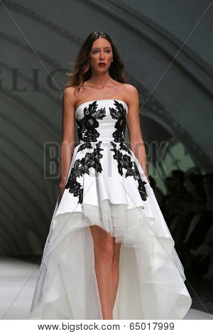 ZAGREB, CROATIA - MAY 09: Fashion model wearing clothes designed by Avaro Figlio on the Zagreb Fashion Week on May 09, 2014 in Zagreb, Croatia.