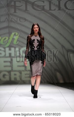 ZAGREB, CROATIA - MAY 09: Fashion model wearing clothes designed by Avaro Figlio on the Zagreb Fashion Week on May 09, 2014 in Zagreb, Croatia.