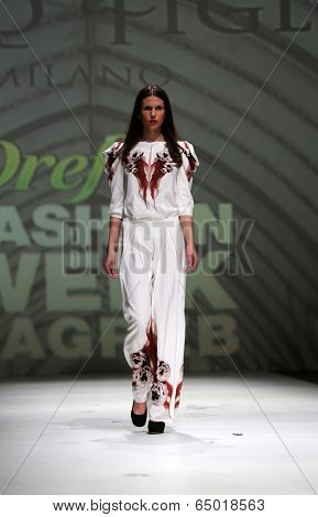 ZAGREB, CROATIA - MAY 09: Fashion model wearing clothes designed by Avaro Figlio on the Zagreb Fashion Week on May 09, 2014 in Zagreb, Croatia.