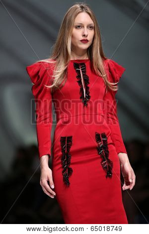 ZAGREB, CROATIA - MAY 09: Fashion model wearing clothes designed by Avaro Figlio on the Zagreb Fashion Week on May 09, 2014 in Zagreb, Croatia.