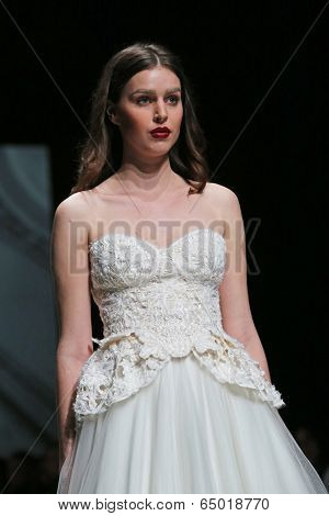 ZAGREB, CROATIA - MAY 09: Fashion model wearing clothes designed by Avaro Figlio on the Zagreb Fashion Week on May 09, 2014 in Zagreb, Croatia.