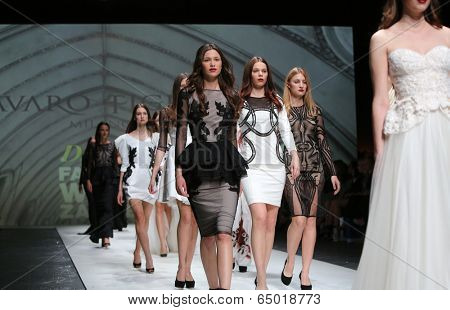 ZAGREB, CROATIA - MAY 09: Fashion model wearing clothes designed by Avaro Figlio on the Zagreb Fashion Week on May 09, 2014 in Zagreb, Croatia.