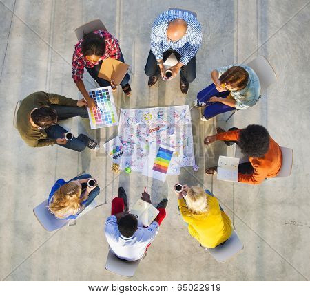 Design Team Planning on a Project with Color Swatches