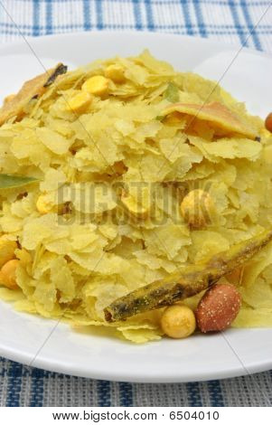 Dry Roasted Chevda On A White Plate