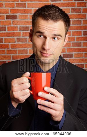 Man with cop of coffee