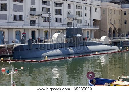 GENOA, ITALY - JUNE 16, 2012: Italian Navy Nazario Sauro class submarine converted to museum (Galata Sea Museum) in Genoa old port.