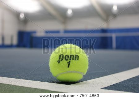 Penn tennis ball at indoor court