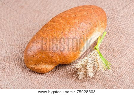Fresh bread with grains and milk