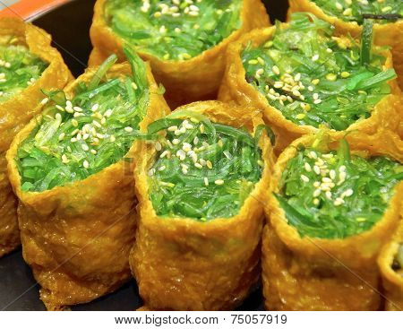 Closeup of sushi with kelp sprout