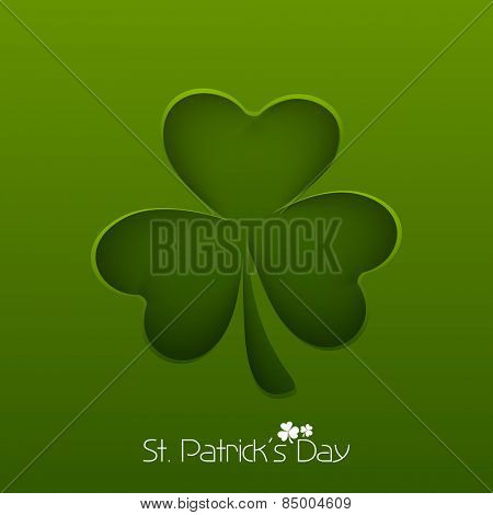 Irish lucky clover leaf on green background for Happy St. Patrick's Day celebration.