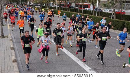 VALENCIA, SPAIN - MARCH 1, 2015: Runners compete in the III 15K Valencia Abierta al Mar run in the streets of Valencia.