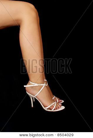 ขาของผู้หญิงใน stilettos