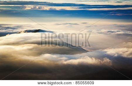 Amazing sunrise seen from Adam's Peak - sacred buddhist place. Sri Lanka