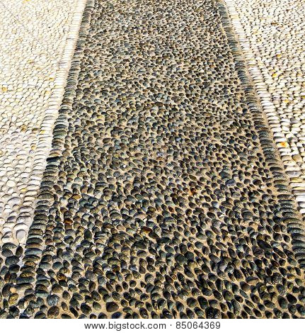 In   Castano Primo  Street L   Pavement Of A Curch And Marble