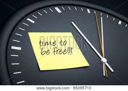 An image of a dark clock with a sticky note and message time to be free