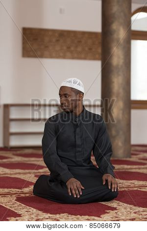 Young African Muslim Guy Praying