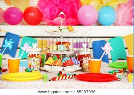 Prepared birthday table with sweets for children party