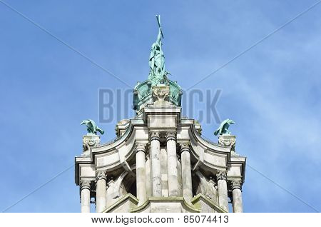 Top of victorian town hall tower depicting St Helena