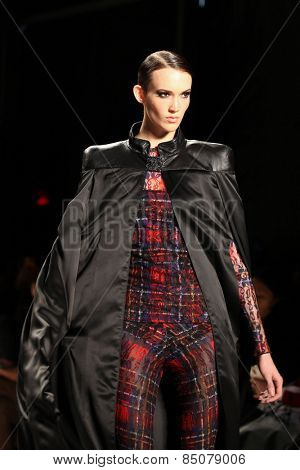 NEW YORK - FEBRUARY 13: A model walks the runway at the Mark & Estel Fall/Winter 2015 collection during Mercedes-Benz Fashion Week in New York on February 13, 2015.