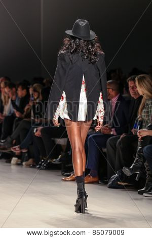 NEW YORK - FEBRUARY 13: A model walks the runway at the Mark & Estel Fall/Winter 2015 collection during Mercedes-Benz Fashion Week in New York on February 13, 2015.