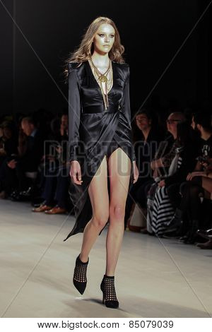 NEW YORK - FEBRUARY 13: A model walks the runway at the Mark & Estel Fall/Winter 2015 collection during Mercedes-Benz Fashion Week in New York on February 13, 2015.