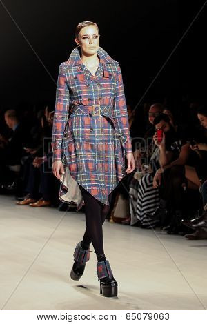 NEW YORK - FEBRUARY 13: A model walks the runway at the Mark & Estel Fall/Winter 2015 collection during Mercedes-Benz Fashion Week in New York on February 13, 2015.