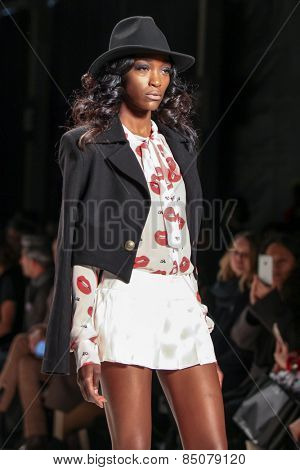 NEW YORK - FEBRUARY 13: A model walks the runway at the Mark & Estel Fall/Winter 2015 collection during Mercedes-Benz Fashion Week in New York on February 13, 2015.