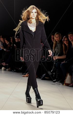 NEW YORK - FEBRUARY 13: A model walks the runway at the Mark & Estel Fall/Winter 2015 collection during Mercedes-Benz Fashion Week in New York on February 13, 2015.
