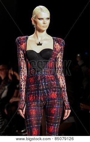 NEW YORK - FEBRUARY 13: A model walks the runway at the Mark & Estel Fall/Winter 2015 collection during Mercedes-Benz Fashion Week in New York on February 13, 2015.