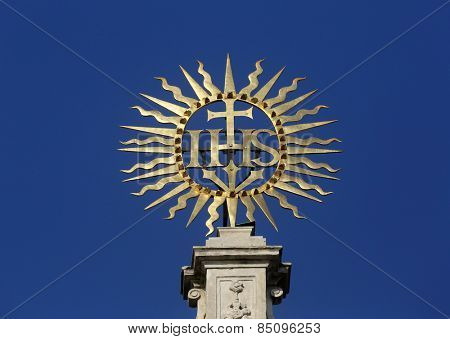 VIENNA, AUSTRIA - OCTOBER 10: IHS sign on baroque Jesuits church. The church was built between 1623 and 1627. in Vienna, Austria on October 10, 2014.