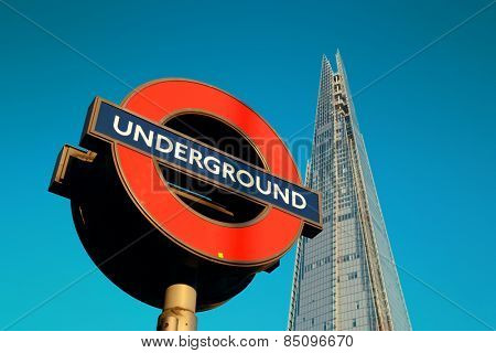 LONDON, UK - SEP 27: The Shard and underground sign on September 27, 2013 in London, UK. the Shard is currently the tallest building in the European Union
